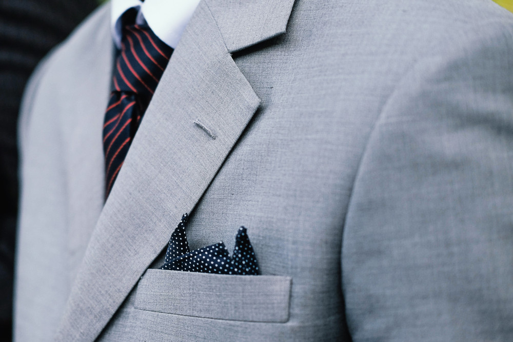 Photo of man in suit by Hardini Lestari on Unsplash